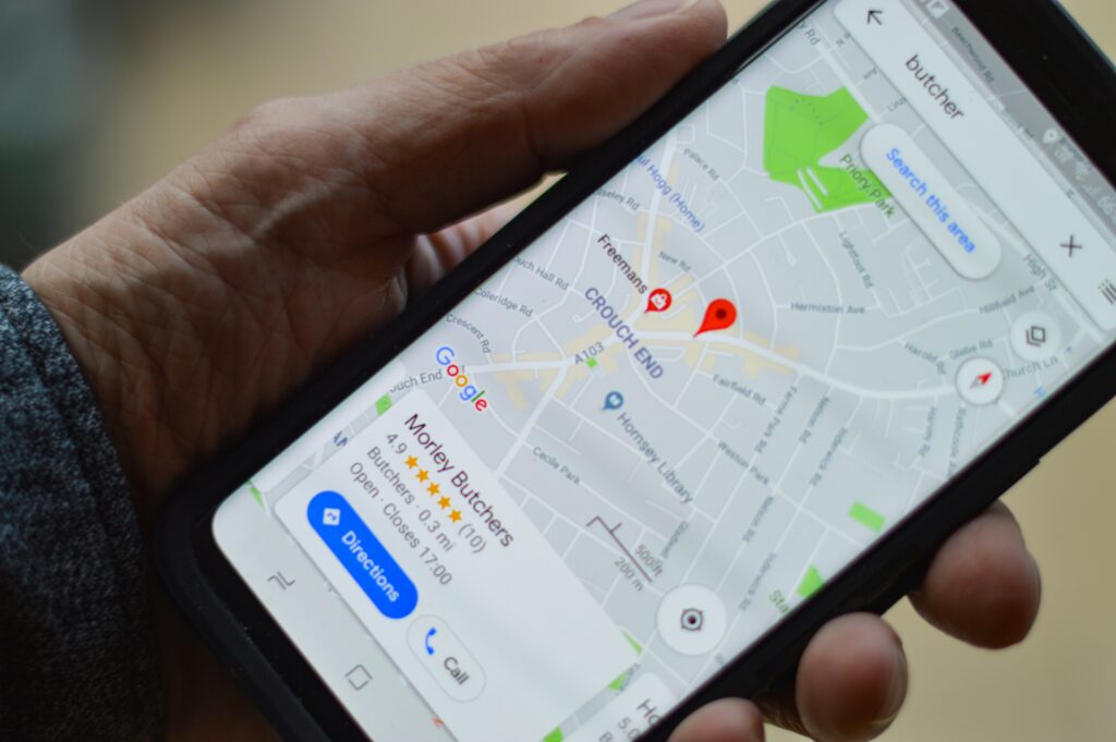 Man looking at google maps by Henry Perks on Unsplash: https://unsplash.com/photos/person-holding-black-smartphone-BJXAxQ1L7dI
