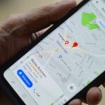 Man looking at google maps by Henry Perks on Unsplash: https://unsplash.com/photos/person-holding-black-smartphone-BJXAxQ1L7dI