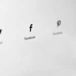 Social media icons displayed on a website by Nordwood Themes on Unsplash: https://unsplash.com/photos/facebook-icon-cNXqmO0Z24U